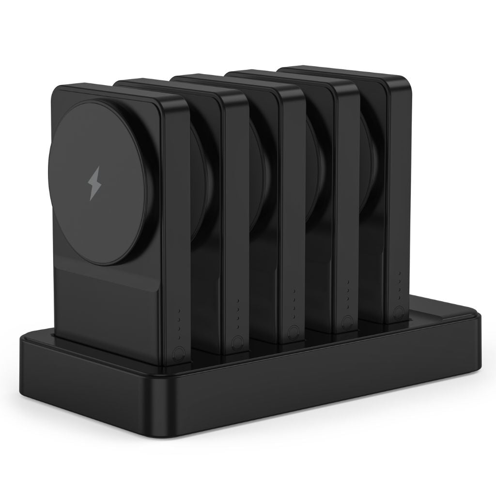 Black wireless charging station with multiple slots on a white background