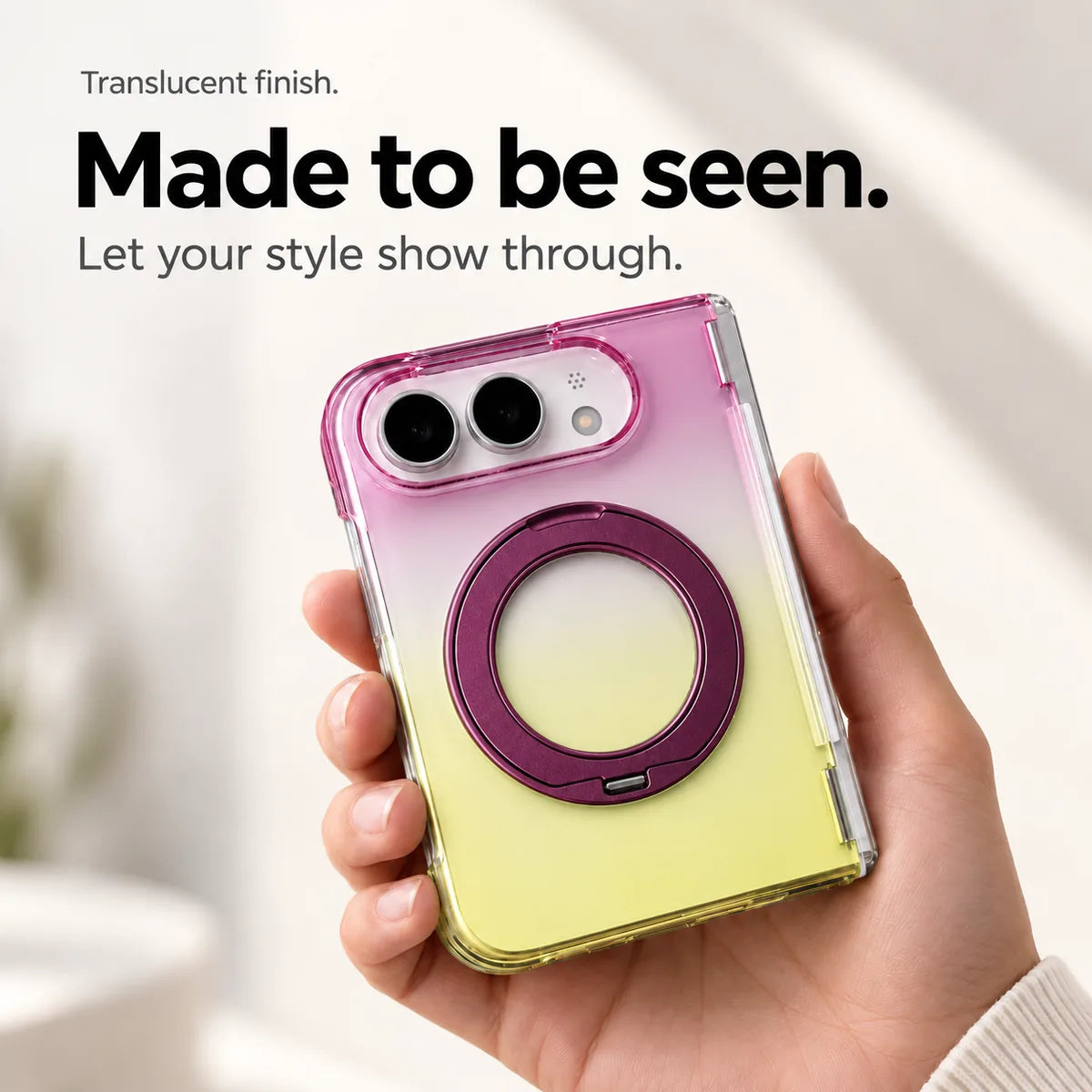 Purple and yellow gradient translucent rear case held in a hand with the ring folded closed. #color_Orchid Glow